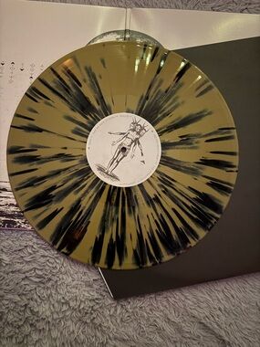 Sleep Token 'Take Me Back to Eden' Vinyl Gold With Black Splatter.